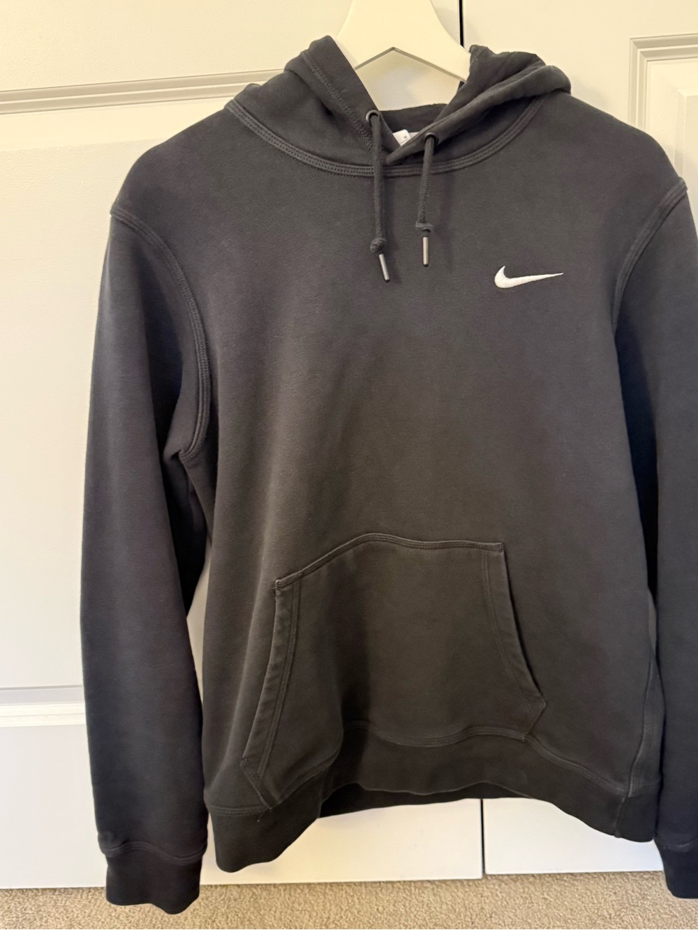 Nike Black Hoodie with White Swoosh Logo